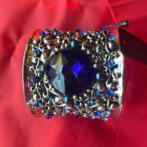 Stunning silver bracelet with faux saphires. Beautifully ornate. NWT